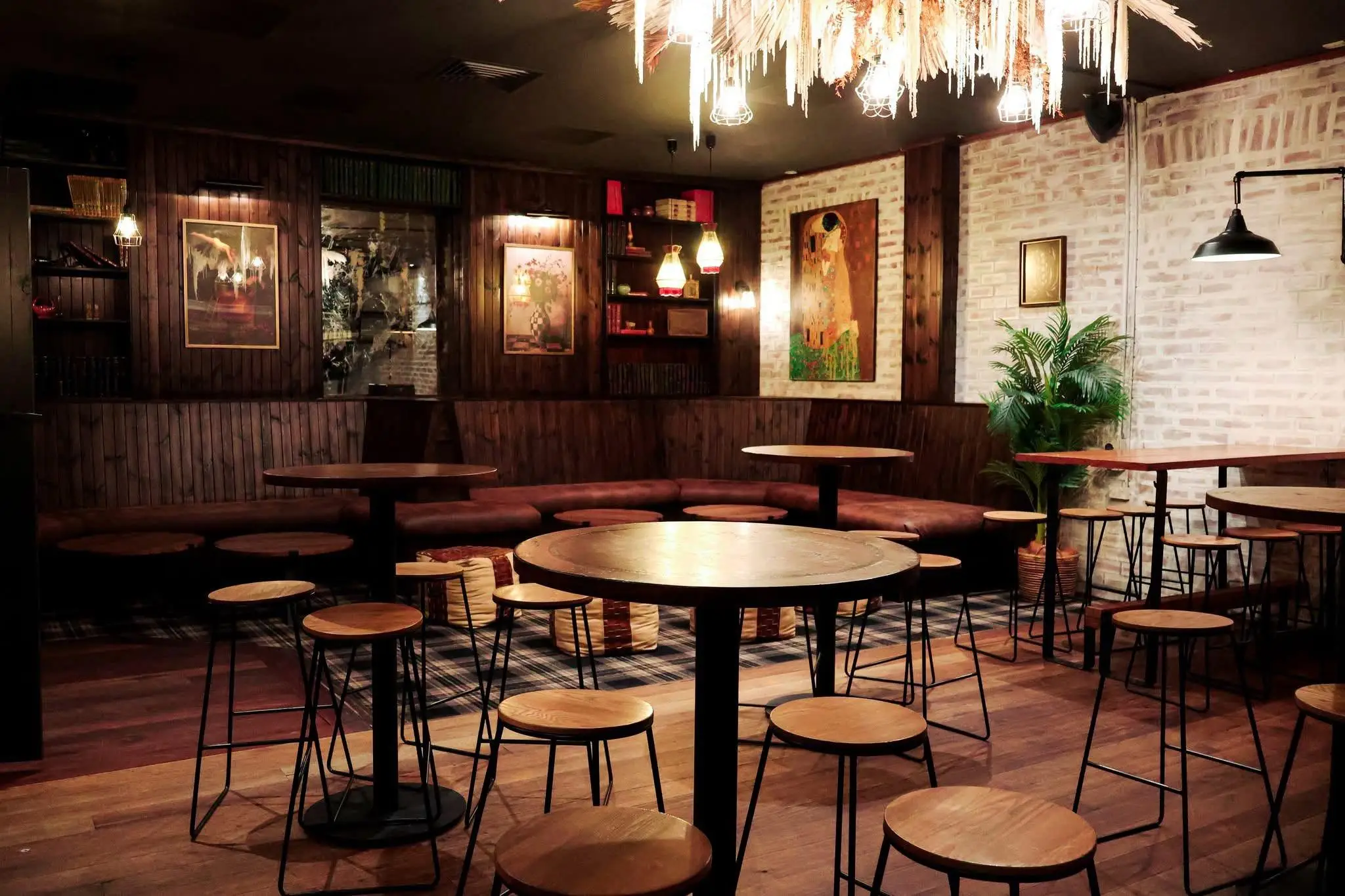 Bar room with high tables, timber stools and banquette seating on a new hardwood floor
